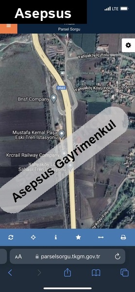 balo projesi i̇cinde yola ve köye yakın satılık tarla